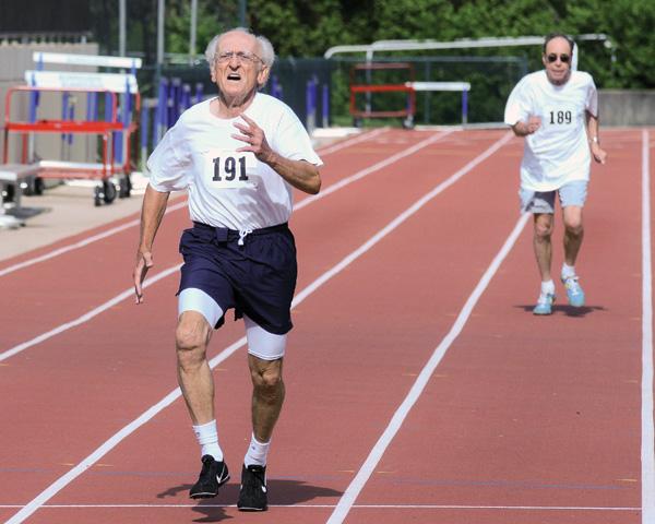 Charles Signorelli, 75, finishes first in the 200-meter dash in the 2009 St. Louis Senior Olympics. 