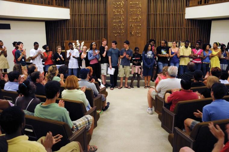 The high school students participating in Cultural Leadership — largely African-American and Jewish — discuss their experiences after a 23-day trip visiting sites across the East Coast and South in July, 2009 at Temple Emanuel. The program, started by Karen Kalish, brings together a group of students for a year of programs designed to promote mutual understanding of African-American and Jewish history, culture and religion. 