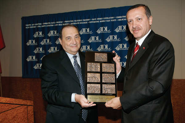 Turkish Prime Minister Recep Tayyip Erdogan receives the Anti-Defamation Leagues Courage to Care Award from ADL National Director Abraham Foxman, June 10, 2005. 