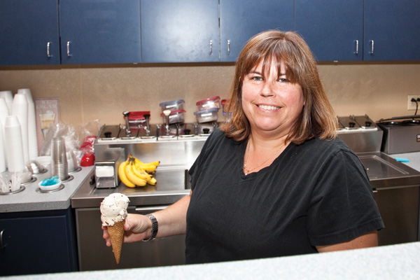 Serendipitys owner Beckie Jacobs behind the counter at her Webster Groves ice cream parlor.