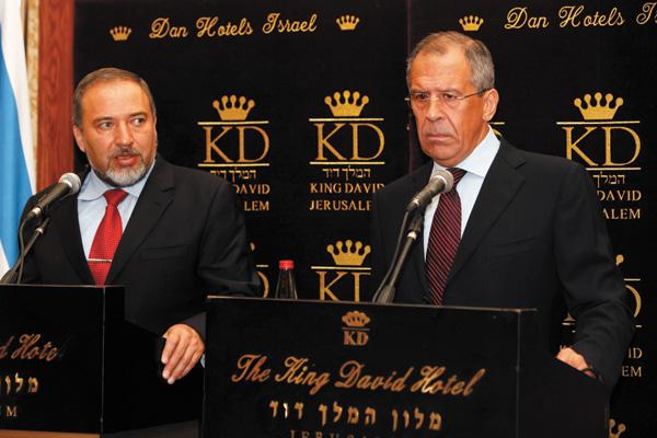 A labor dispute at Israels Foreign Ministry nearly derailed a trip to Israel in June by Russian Foreign Minister Sergey Lavrov, seen here at a news conference with Israeli counterpart Avigdor Leiberman, when nobody came to pick Lavrov up from the airport. 