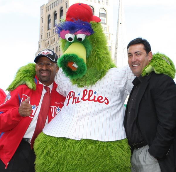 Ruben Amaro Jr., right, the general manager of the Philadelphia Phillies, joins Mayor Michael Nutter and the team's mascot at a pep rally in Philadelphia during the playoffs in 2009. 