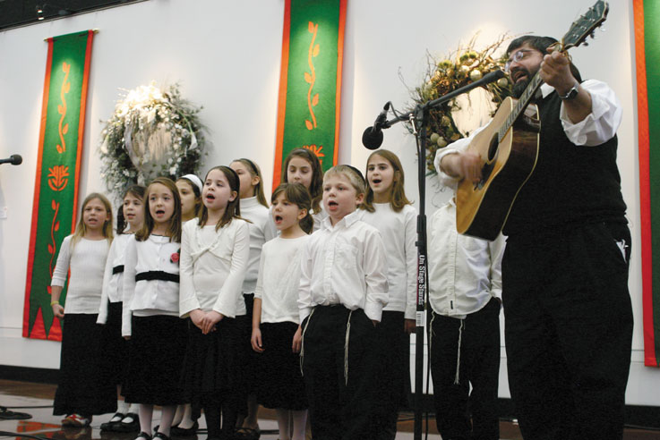 Rabbi+Dan+Morris+leads+students+from+Epstein+Hebrew+Academy+in+song+during+a+2007+Hanukkah+celebration+at+the+Missouri+Botanical+Garden.+File+photo%3A+Mike+Sherwin