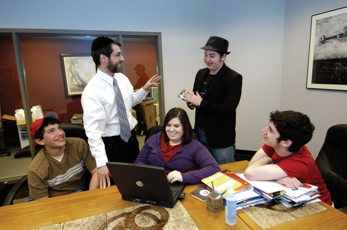 Rabbi Mike Rovinsky (center) is shown with a Jewish Student Union (JSU)group in this 2007 file photo. JSU offers a Jewish club for students at non-Jewish high schools.  File photo: Kristi Foster