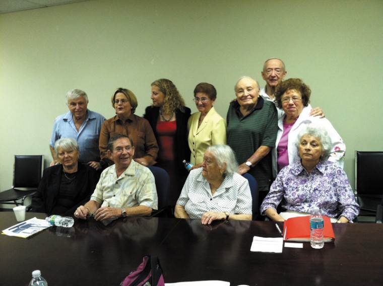 Rep. Debbie Wasserman Schultz (D-Fla., top row, second from left), and Rep. Ileana Ros-Lehtinen (R-Fla., top row, third from left) at a meeting in Florida to discuss federal social services programs with Holocaust survivors, April 21. Photo: William Daroff