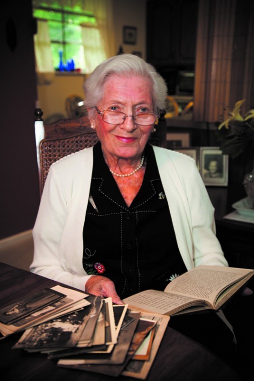 LEFT AND BELOW: 
Holocaust survivor Elsie Levy, of Olivette, holds some of the family artifacts sent to her from Germany.  During the Nazi era, Levy’s parents left a box of family artifacts with a neighbor for safe-keeping. The family only recently discovered the rightful owner of the contents of the box.