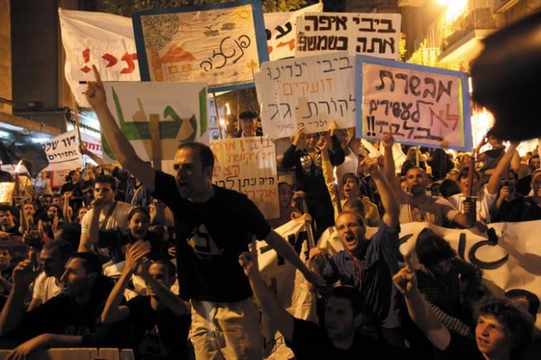 Thousands of Israelis march through the streets of Jerusalem on
Aug. 27 as they protest social inequalities and high living costs.
Photo: Yossi Zamir/Flash 90/JTA
