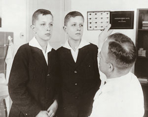 In a laboratory at a former eugenics institute in Berlin,
geneticist Otmar von Verschuer examined twins to study hereditary
links to criminality, mental retardation, tuberculosis and cancer.
In 1927, he recommended the forced sterilization of the mentally
and morally subnormal. Archiv zur Geschichte der
Max-Planck-Gesellschaft, Berlin
