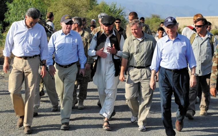 Sen. Joe Lieberman, right, shown visiting special operations
forces in Afghanistan on July 4, says his strong Jewish faith leads
him to forge an independent path, striking alliances with both
parties. Photo: Sgt. Lizette Hart, U.S. Military Public Affairs
