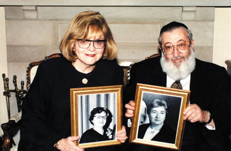 Rebbetzin+Paula+and+Rabbi+Sholom+Rivkin+are+pictured+in+a+Jewish%0ALight+file+photo+holding+photographs+of+their+respective+mothers%2C%0Ain+whose+honor+the+Rivkin-Zuckerman+Shabbat+Mikvah+was+named.%0A