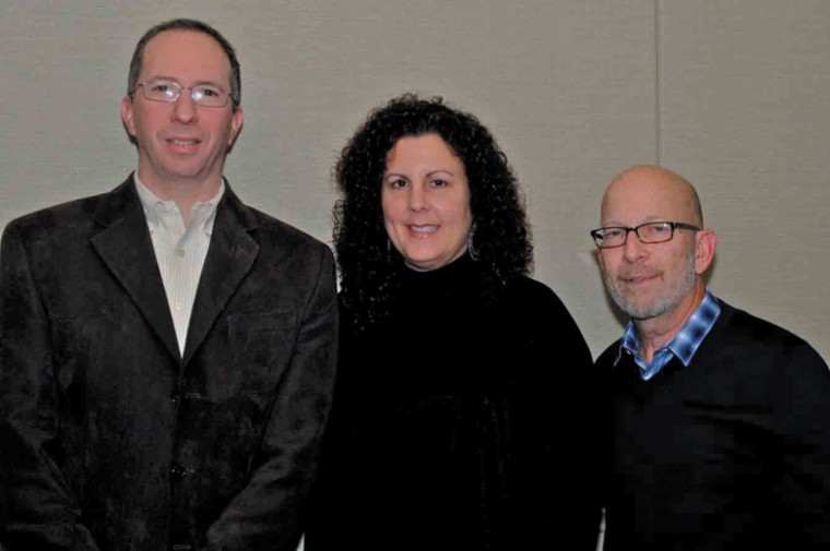 Chairs Cindy Hyken, JF&amp;CS board vice president financial
development, (center) with board members David Weiss (left) and
Rick Rovack.
