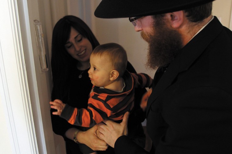Chana and Rabbi Avraham Lapine have started a new Chabad student
center at Mizzou. The couple is shown with their son, Mendel.
