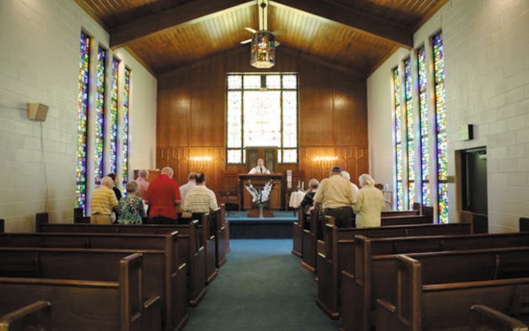 St. Louis native Rabbi Marshal Klaven presides at the
‘deconsecration' of Beth Ahaba's temple in Muskogee, Okla. last
year. Klaven, 31, travels across 13 states to serve Jews in rural
Southern communities.
