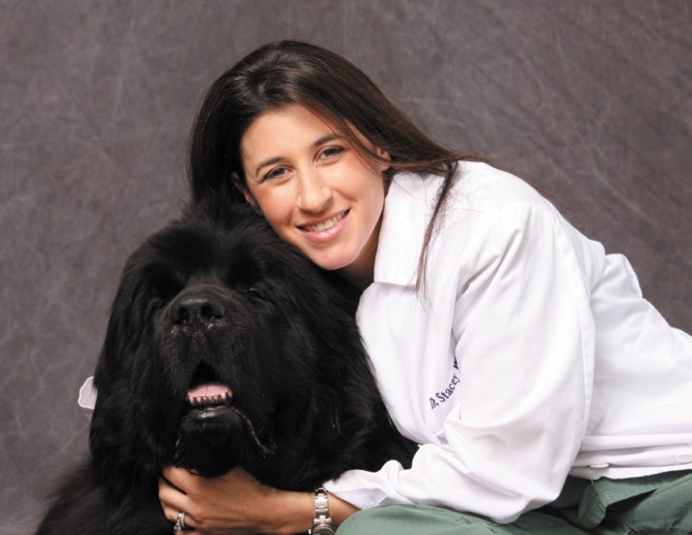 Dr.+Stacey+Wallach+with+her+Newfoundland%2C+Duke%2C+one+of+her+three%0Adogs.%0A