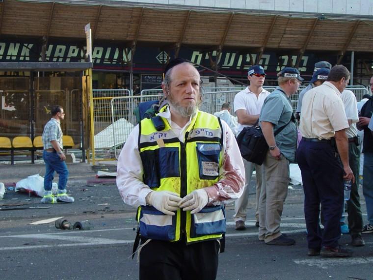 ZAKA chairman Yehuda Meshi Zahav at the site of the June 2003
suicide attack on the No 14 bus in Jerusalem.
