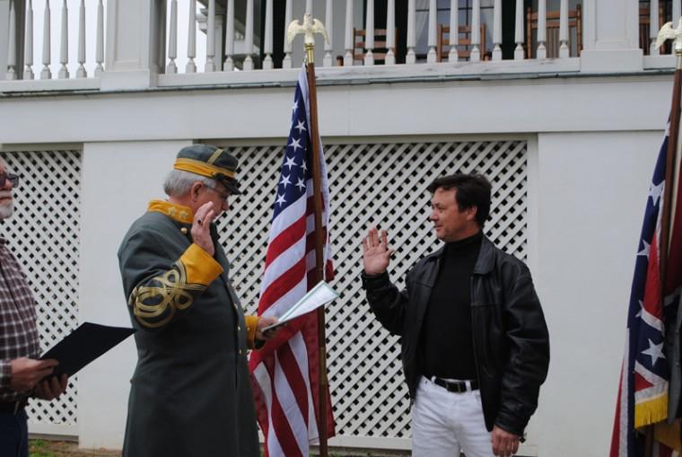 Arieh O'Sullivan takes the pledge to join the Sons of Confederate Veterans at a ceremony in Biloxi, Miss., Feb. 22, 2012.
