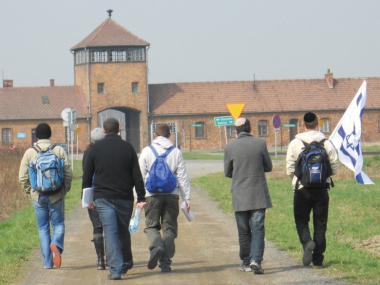 Young Jews entering the gates of Auschwitz-Birkenau Extermination Camp in Poland during the 2010 March of Living.
