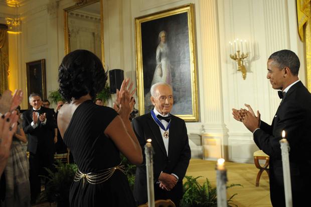 President Obama presenting the Presidential Medal of Freedom to Israeli President Shimon Peres in the East Room of the White House in Washington, June 13, 2012.

