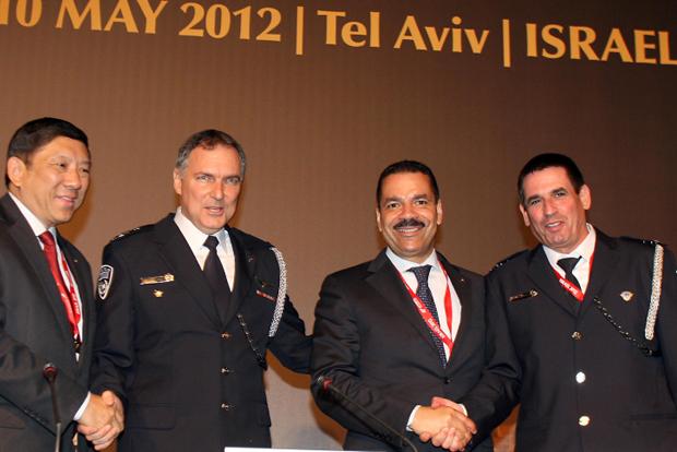 Left to right, Interpol President Khoo Boon Hui, Israeli police chief Yohanan Danino, and Interpol officials Ronald Kenneth Noble and Yoav Segalovitz, at the international police organizations European Regional Conference in Tel Aviv, May 8, 2012.
