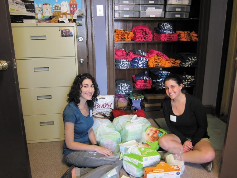 Anna Sher (left) and Amanda Shuman participate in a previous Karen Solomon Young Adult Service Initiative volunteer event. 
