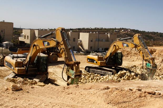 Two Caterpillar bulldozers used for the construction work at the Jewish settlement of Elazar, outside Jerusalem, September 2010.
