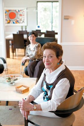 Sarijane Freiman with her daughter, Rebecca Helfer, in the background. The photo was taken in Mrs. Freimans home. 