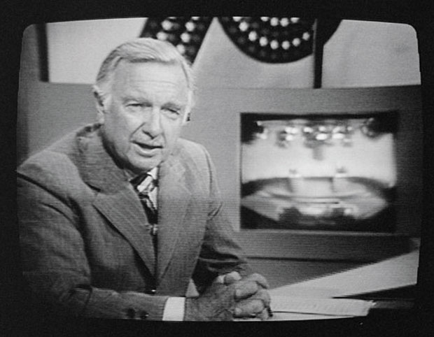 Walter Cronkite on TV during a presidential debate between Gerald Ford and Jimmy Carter in 1976.
