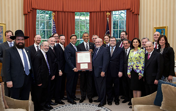 President Barack Obama is photographed with Orthodox Jewish rabbis inthe Oval Office, June 5, 2012.
