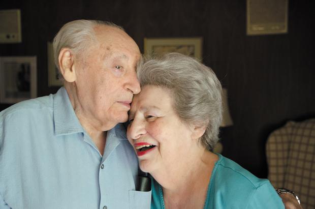 Sara and Leo Wolf are pictured at their home last week. The couple, both Holocaust survivors, were active in the founding of the Holocaust Museum and Learning Center. The HMLC plans to honor the couple during an event Aug. 5.
