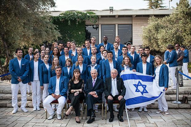 Israeli+President+Shimon+Peres%2C+seated+second+from+right%2C+with+his+countrys+Olympic+delegation+for+the+London+Games%2C+July+9%2C+2012.%0A