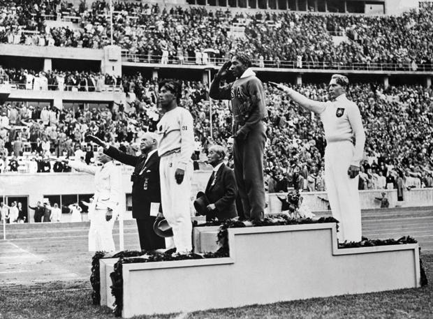 In 1936, both winter and summer games were held in Nazi Germany (a medal ceremony from the Berlin summer games is pictured), leaving a quandary for Jewish St. Louisan Mel Dubinsky, a contender for the Olympic team in ice skating.
