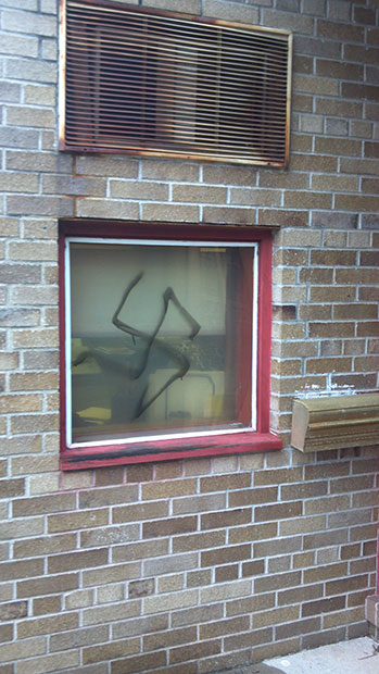 A+swastika+spray-painted+on+a+window+of+Temple+Beth+Israel+in+Hackensack%2C+N.J.%2C+Dec.+10%2C+2011.%0A
