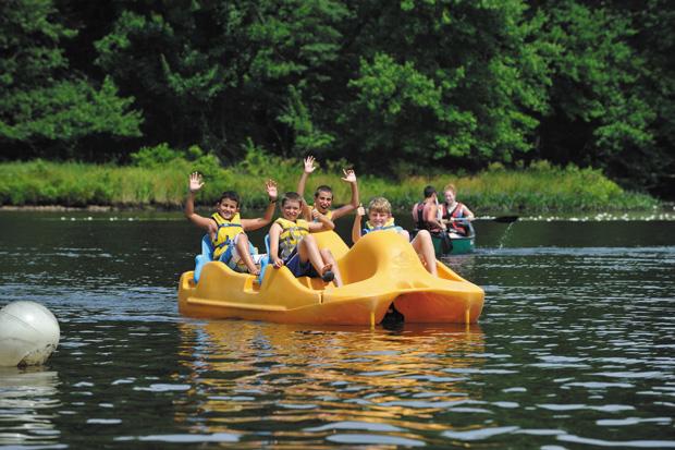 Jewish+campers+on+a+pedal+boat+show+their+enthusiasm+at+NYJ%C2%A0+Cedar+Camp+in+New+Jersey.+Photo%3A+Foundation+for+Jewish+Camp%0A