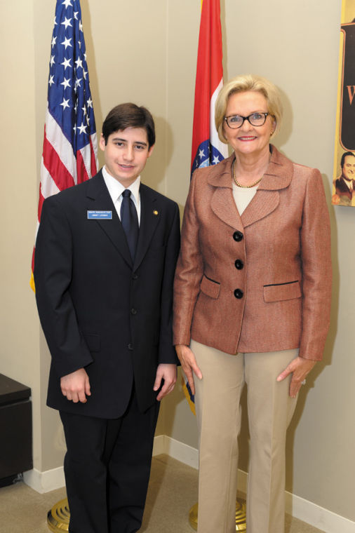 Jimmy Loomis stands with Sen.Claire McCaskill during his tenure as a Senate page.
