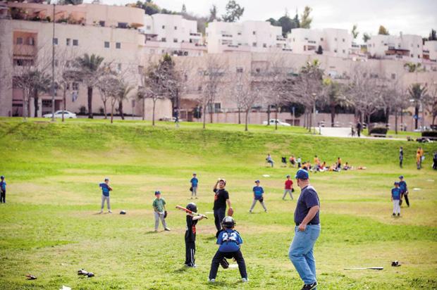 Little League baseball players practice in Modiin, Israel.
