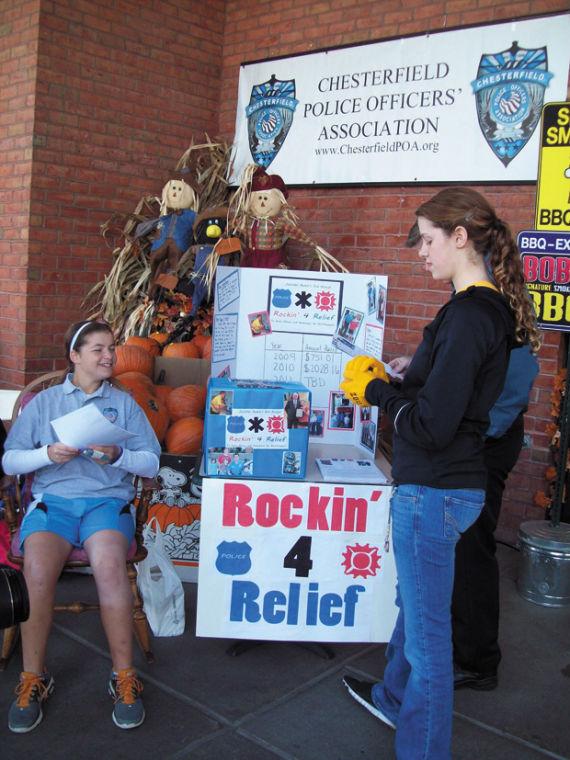 At the 2011 Rockin’ For Relief, Jennifer helps fundraise from Dierbergs shoppers.
