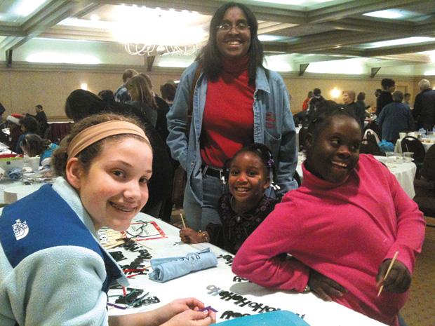 Rachel Walters (left) volunteered at the Children’s Home Society of Missouri  as well as the Down Syndrome Association of Greater St. Louis
