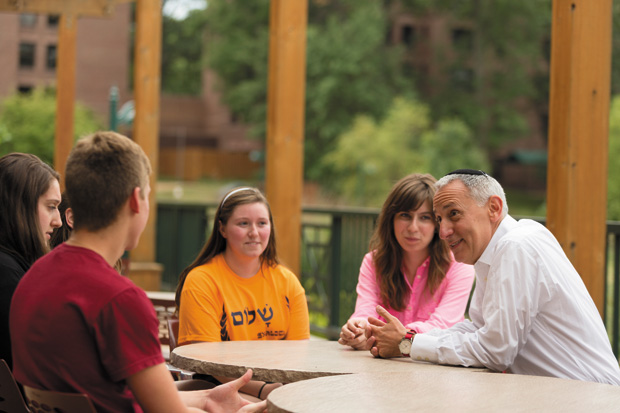 Eric Fingerhut, Hillel’s new president and CEO, speaks with students at Washington University during the Hillel conference there this week. 