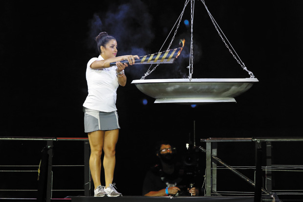 U.S. Olympic gymnast and gold medalist Aly Raisman lighting the torch during the opening ceremony of the 19th Maccabiah Games at Jerusalem’s Teddy Stadium, July 19, 2013. 