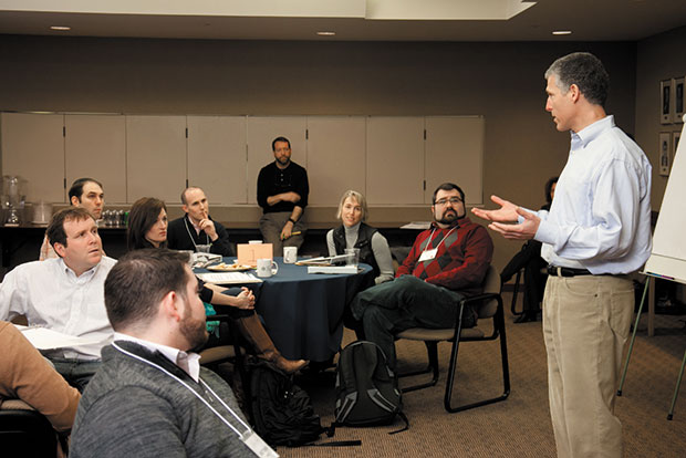 Robert Millstone, then-Board Chair of Jewish Federation of St. Louis (standing at right), speaks to the 2012 class  of Millstone Fellows. Jewish Light file photo 