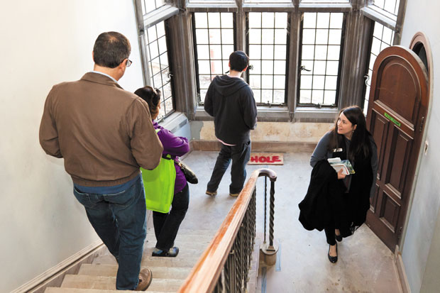 St. Louis Hillel Executive Director Jackie Ulin Levey leads a tour of the Hillel building, which is currently under construction. Photo: Lisa Mandel 