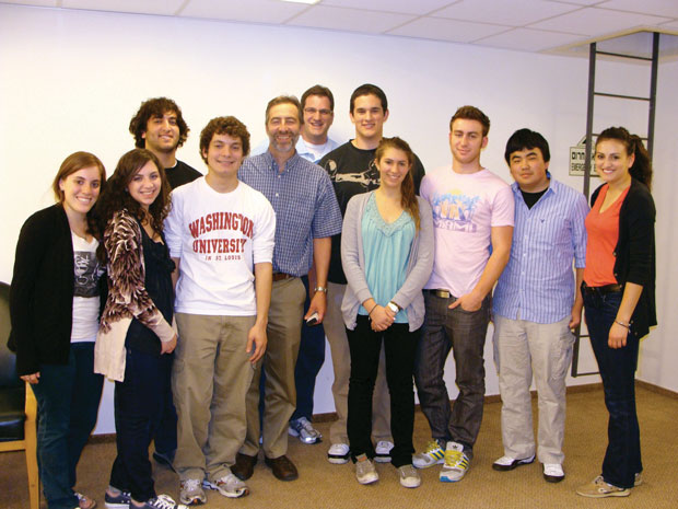 Students in Washington University Assistant Dean Steve Malter’s 2010 ‘Business in Israel’ class visit Saul Singer (fifth from the left), co-author of ‘Start-Up Nation: The Story of Israel’s Economic Miracle’ during their visit to the Jewish State. 