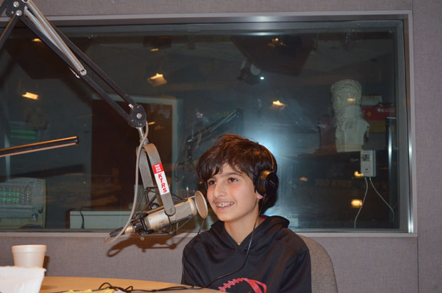 RADIO-ACTIVE • Working as a sports analyst for KTRS radio station, budding star Max Baker, a student at Ladue Middle School, offers insight into the world of professional athletics.  (Photo by Daniella Kats) 