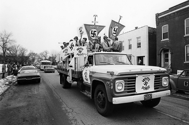 A+truck+carries+43+delegates+of+American+Nazi+groups+on+a+ride+through+south+St.+Louis+in+1978.+The+delegates+were+in+town+for+a+convention+of+the+National+Socialist+Party+of+America.+Originally+planned%C2%A0as+a+march%2C+the+group+opted+for%C2%A0+a+ride+amid+a+hostile+crowd%C2%A0+of+an+estimated+3%2C000%C2%A0+counter+demonstrators.+Light+archive+photo+by+David+Henschel