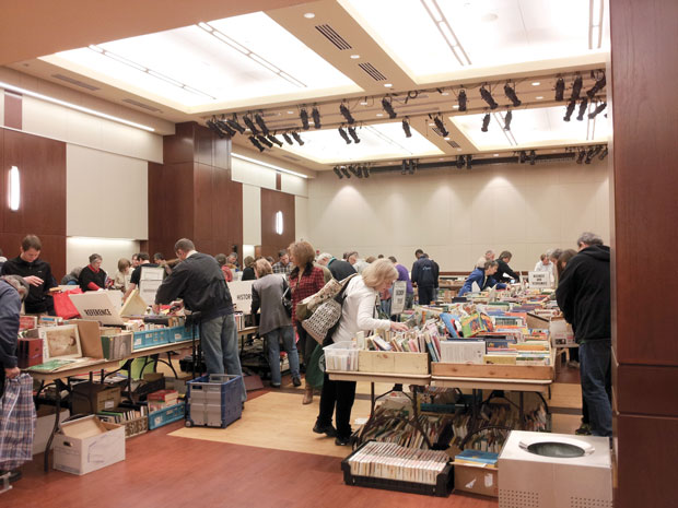 Shoppers browse the offerings at the Jewish Community Center’s used book sale last February. Photo courtesy JCC 