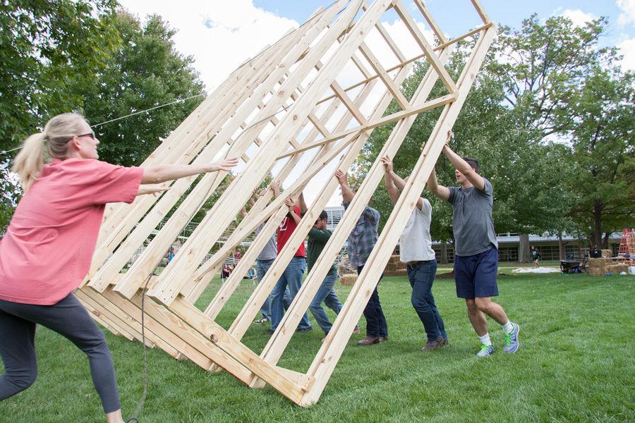 University+of+Louisiana+at+Lafayette+professor+Ashlie+Latiolais+gets+help+from+her+team+and+the+Kansas+State+team+in+raising+the+14-foot+structure+of+Latiolais+sukkah+design+on+Oct.+6%2C+2014+at+Washington+University.+Latiolais+design+was+one+of+10+finalists+in+Sukkah+City+STL%2C+held+by+St.+Louis+Hillel+and+Wash+U.+The+teams+constructed+their+sukkot+on+the+quadrangle+just+west+of+the+universitys+Olin+Library.