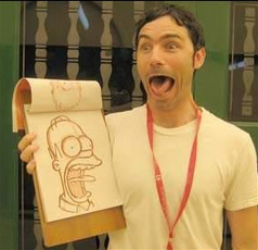 Lucas Gray posing with one of his animations.