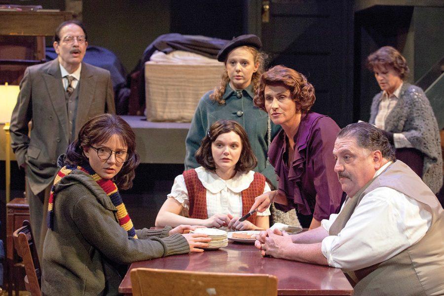 Samantha Moyer (seated at center) as Anne Frank  in the New Jewish Theatre’s fall 2014 production of ‘The Diary of Anne Frank.’ The play earned the NJT seven of its 12 St. Louis Theater Circle Award nominations for the NJT’s 2014 productions.   