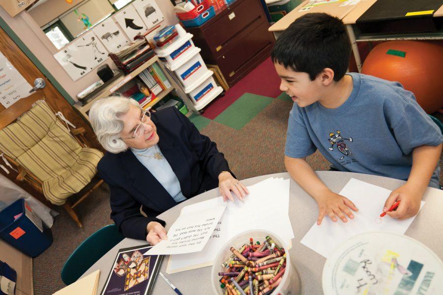 Dorothy Meyerson works with a student at the Miriam School and Learning Center in March. Photos: Lisa Mandel 