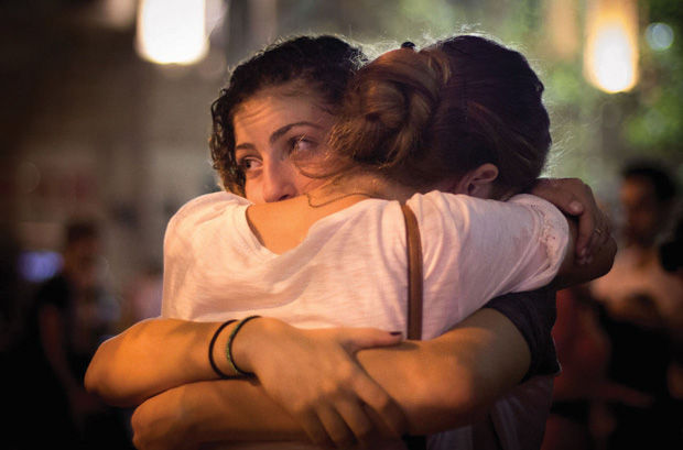 Israelis participating in a memorial service in Jerusalem for Shira Banki, who was fatally wounded in an attack at Jerusalem’s gay pride parade, Aug. 2, 2015. Photo: Garrett Mills/Flash90